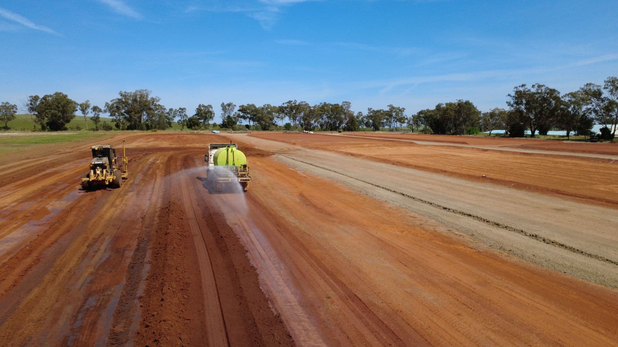 Grain bunker prep, Grader & water truck