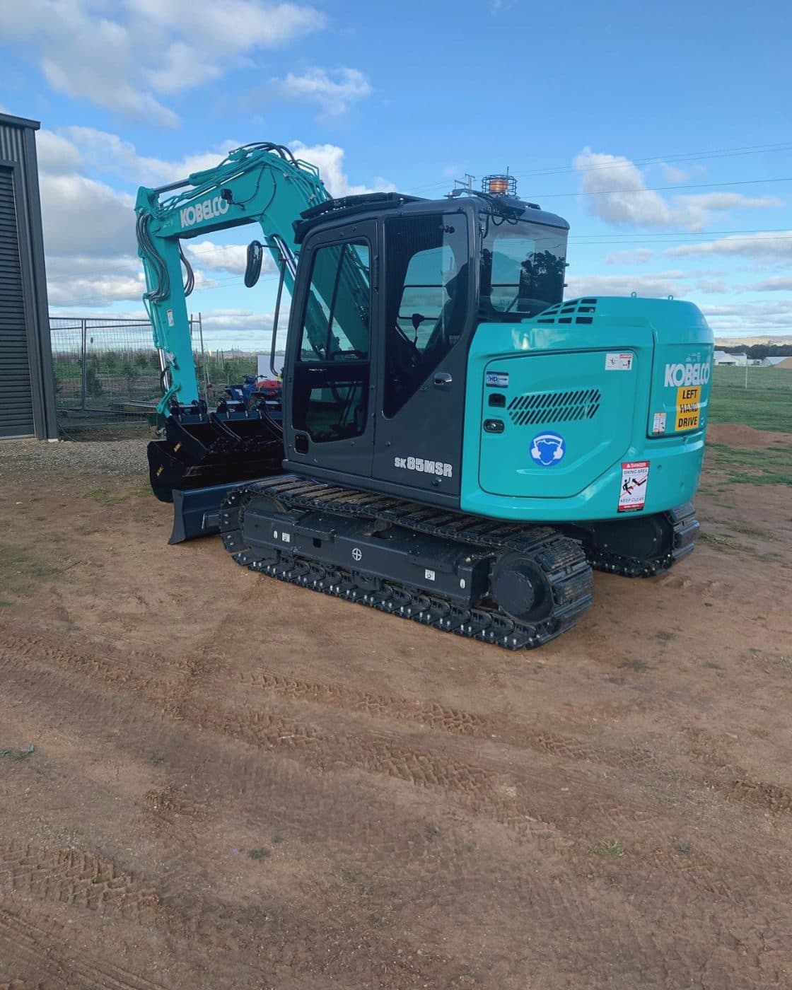 Wagga Civil and Earthworks Kobelco excavator in the yard